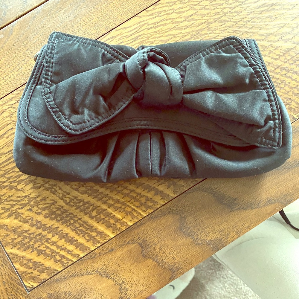 Satin bow clutch